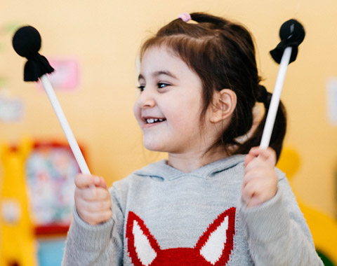 Girl drumming